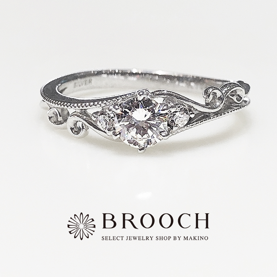 BROOCH　婚約指輪　エンゲージリング　ミル打ちウェーブ花冠風デザイン